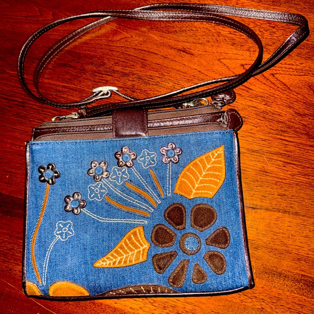 Brighton denim , leather, appliqué, embroidered flower purse
8 by 7